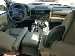 2004 Land Rover Discovery SE z VIN SALTY19414A846664, wystawiony jako Copart lot #59127655 z przebiegiem 182 800 mil mil oraz Czysty tytuł • Clean title. Historia ofert i sprzedaży dostępna na DreamBid. Obrazek 8.