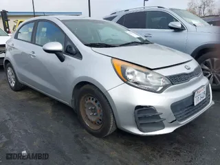2016 Kia Rio LX with VIN KNADM5A36G6646238, listed as a IAAI auction lot 41748617 with 129,243 mi miles. Bid and sale history available at carsss.com. Image 1.