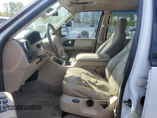 2004 Ford Expedition Special Service with VIN 1FMEU15W04LA49387, listed as a Copart auction lot 52386065 with 322,325 mi miles and Salvage title. Bid and sale history available at DreamBid. Image 7.