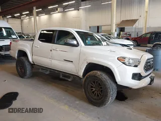 2018 Toyota Tacoma SR with VIN 3TMCZ5AN0JM164924, listed as a IAAI auction lot 41754508 with 59,038 mi miles. Bid and sale history available at carsss.com. Image 1.