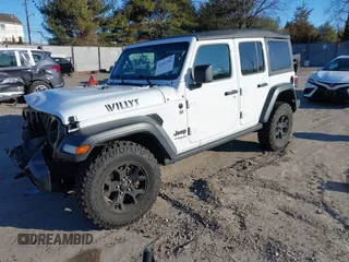 2021 Jeep Wrangler Unlimited Sport S with VIN 1C4HJXDG5MW697149, listed as a IAAI auction lot 41642386 with 71,253 mi miles. Bid and sale history available at carsss.com. Image 17.