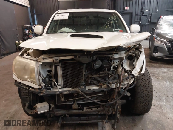 2009 Toyota Tacoma with VIN 5TEMU52N89Z620734, listed as a IAAI auction lot 41365825 with 336,070 mi miles and . Bid and sale history available at DreamBid. Image 6.