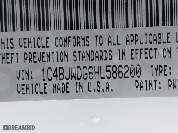 2017 Jeep Wrangler Unlimited Sport with VIN 1C4BJWDG6HL586200, listed as a IAAI auction lot 41723891 with 125,291 mi miles. Bid and sale history available at carsss.com. Image 9.