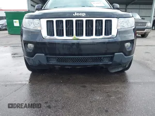 2012 Jeep Grand Cherokee Laredo with VIN 1C4RJEAG2CC259279, listed as a IAAI auction lot 41768024 with 185,161 mi miles. Bid and sale history available at carsss.com. Image 6.