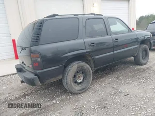 2003 GMC Yukon SLT with VIN 1GKEC13ZX3R181111, listed as a IAAI auction lot 41496338 with 307,996 mi miles. Bid and sale history available at carsss.com. Image 4.