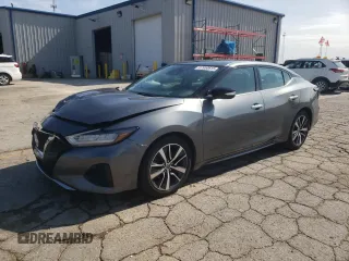 2020 Nissan Maxima SV with VIN 1N4AA6CV0LC361023, listed as a Copart auction lot 57950615 with 124,224 mi miles and Salvage title. Bid and sale history available at DreamBid. Image 1.