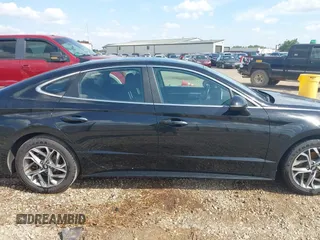 2020 Hyundai Sonata SEL z VIN 5NPEF4JA9LH043617, wystawiony jako IAAI lot #42163333 z przebiegiem 61 662 mil mil oraz . Historia ofert i sprzedaży dostępna na DreamBid. Obrazek 13.