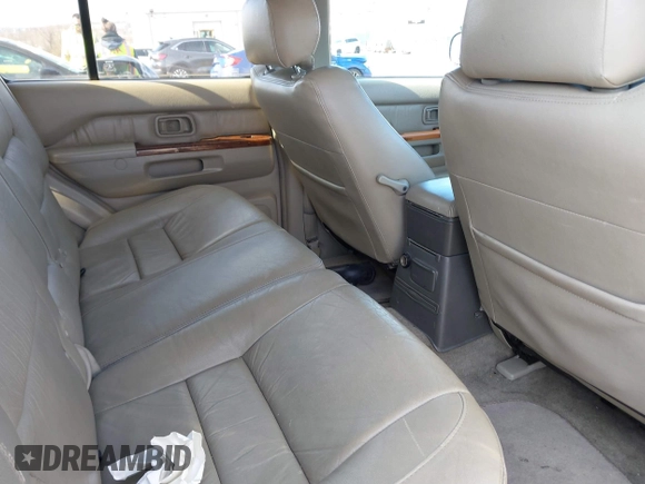 1998 Infiniti QX4 with VIN JNRAR05Y0WW027570, listed as a IAAI auction lot 41882870 with 147,639 mi miles and . Bid and sale history available at DreamBid. Image 8.