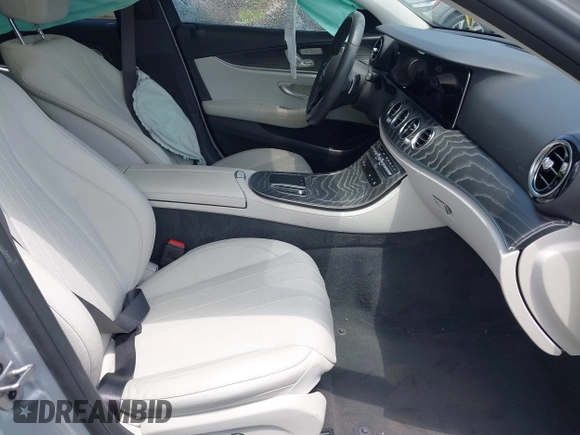 2021 Mercedes-Benz E 350 with VIN W1KZF8DB4MA977647, listed as a IAAI auction lot 42241573 with 33,666 mi miles and . Bid and sale history available at DreamBid. Image 5.