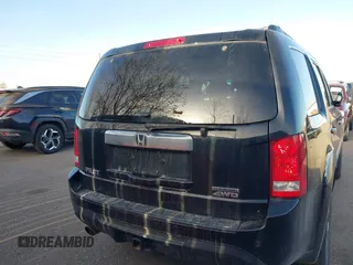 2012 Honda Pilot Touring with VIN 5FNYF4H93CB077057, listed as a IAAI auction lot 41156160 with 139,834 mi miles and . Bid and sale history available at DreamBid. Image 16.