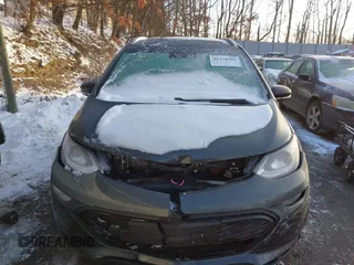 2021 Chevrolet Bolt EV Premier z VIN 1G1FZ6S09M4113694, wystawiony jako IAAI lot #41378289 z przebiegiem 40 979 mil mil oraz . Historia ofert i sprzedaży dostępna na DreamBid. Obrazek 13.