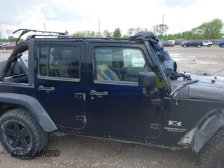 2008 Jeep Wrangler Unlimited X with VIN 1J4GA39108L501130, listed as a IAAI auction lot 42182601 with 177,507 mi miles and . Bid and sale history available at DreamBid. Image 14.