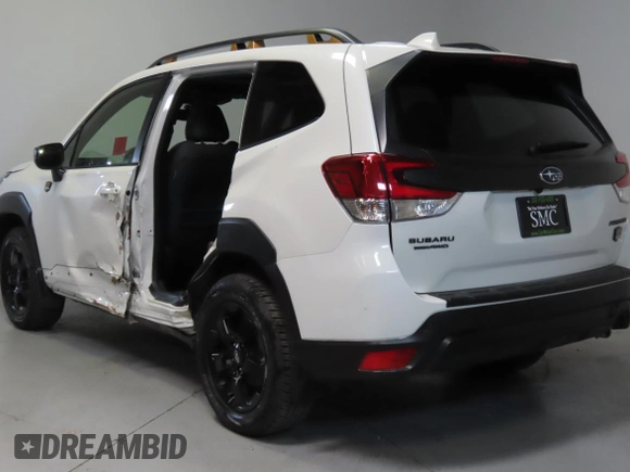 2023 Subaru Forester Wilderness with VIN JF2SKAMC7PH464218, listed as a Copart auction lot 59016725 with 8,827 mi miles and Salvage title. Bid and sale history available at DreamBid. Image 4.