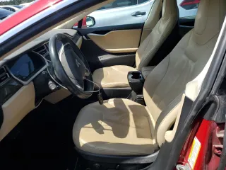 2014 Tesla Model S 60 with VIN 5YJSA1H13EFP30664, listed as a Copart auction lot 53142305 with 113,995 mi miles and Salvage Title. Bid and sale history available at DreamBid. Image 7.