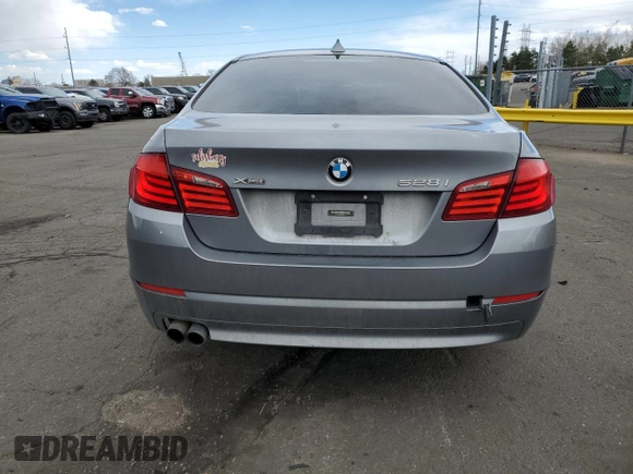 2013 BMW 5 Series 528i xDrive with VIN WBAXH5C53DDW15133, listed as a Copart auction lot 49811025 with 114,039 mi miles and Salvage Title. Bid and sale history available at carsss.com. Image 6.