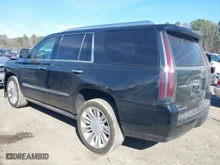 2016 Cadillac Escalade Platinum with VIN 1GYS4DKJ3GR217116, listed as a IAAI auction lot 41679348 with 122,811 mi miles. Bid and sale history available at carsss.com. Image 3.