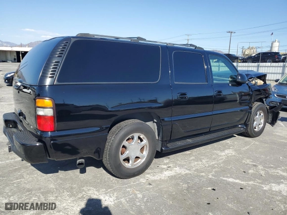 2005 GMC Yukon XL Denali with VIN 1GKFK66U15J136709, listed as a Copart auction lot 70467974 with 112,407 mi miles and Salvage Title. Bid and sale history available at carsss.com. Image 3.
