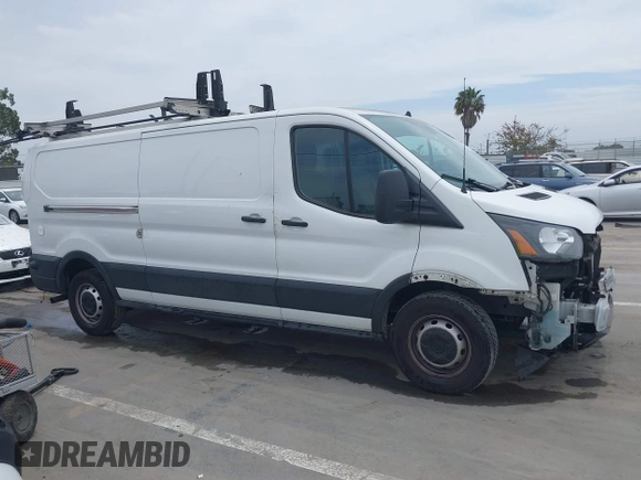 2020 Ford Transit Cargo z VIN 1FTYE1Y86LKA19374, wystawiony jako IAAI lot #42362018 z przebiegiem 93 512 mil mil oraz . Historia ofert i sprzedaży dostępna na DreamBid. Obrazek 14.