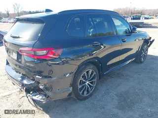 2021 BMW X5 xDrive40i with VIN 5UXCR6C09M9F83785, listed as a IAAI auction lot 41828697 with 57,863 mi miles. Bid and sale history available at carsss.com. Image 4.