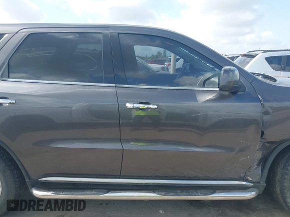 2013 Dodge Durango SXT with VIN 1C4RDHAG4DC686389, listed as a IAAI auction lot 42440260 with 166,952 mi miles and . Bid and sale history available at DreamBid. Image 13.