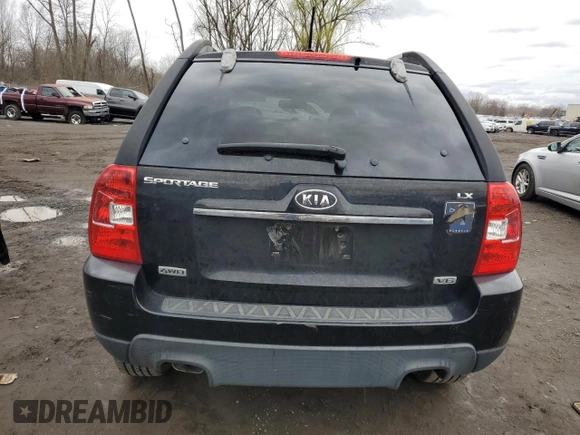 2009 Kia Sportage LX with VIN KNDJE723097622429, listed as a Copart auction lot 52960575 with 167,492 mi miles and Salvage Title. Bid and sale history available at carsss.com. Image 6.