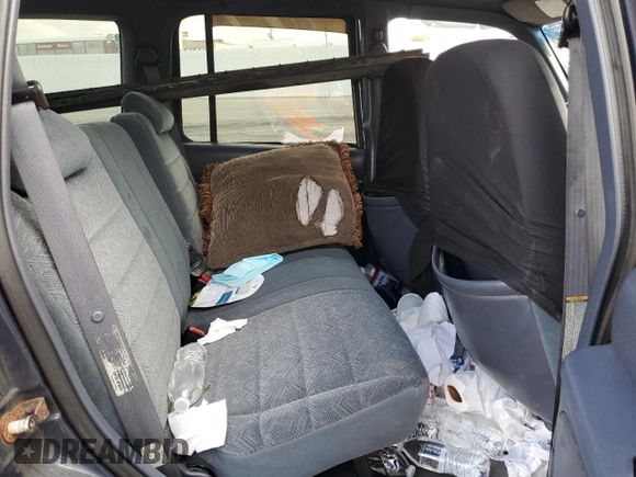 1998 Ford Explorer XL z VIN 1FMZU34EXWZA13244, wystawiony jako Copart lot #54456095 z przebiegiem 192 527 mil mil oraz Szkoda całkowita • Salvage title. Historia ofert i sprzedaży dostępna na DreamBid. Obrazek 11.