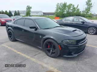 2020 Dodge Charger SRT Hellcat z VIN 2C3CDXL9XLH134202, wystawiony jako IAAI lot #42402856 z przebiegiem 24 675 mil mil oraz . Historia ofert i sprzedaży dostępna na DreamBid. Obrazek 1.