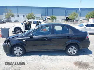 2008 Chevrolet Aveo LS with VIN KL1TD56678B123487, listed as a IAAI auction lot 42588212 with 119,882 mi miles and . Bid and sale history available at DreamBid. Image 15.