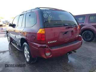 2003 GMC Envoy SLT with VIN 1GKDS13S132118361, listed as a IAAI auction lot 41909425 with 283,342 mi miles. Bid and sale history available at carsss.com. Image 3.