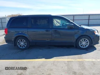 2014 Dodge Grand Caravan SXT with VIN 2C4RDGCG1ER167624, listed as a IAAI auction lot 41888822 with 202,729 mi miles and . Bid and sale history available at DreamBid. Image 13.