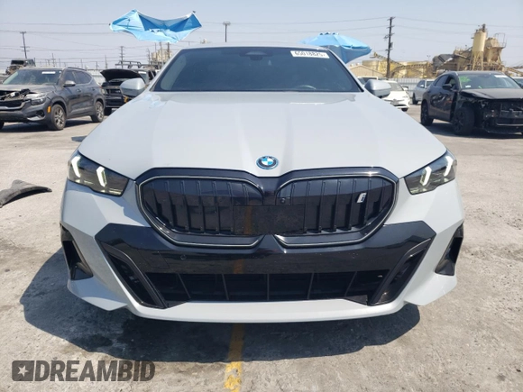 2024 BMW i5 eDrive40 with VIN WBY33FK09RCR17369, listed as a Copart auction lot 65018825 with 3,853 mi miles and Clean title. Bid and sale history available at DreamBid. Image 5.