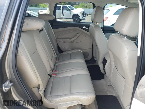 2015 Ford Escape Titanium with VIN 1FMCU0J98FUA46879, listed as a Copart auction lot 51173555 with 72,093 mi miles and Salvage Title. Bid and sale history available at DreamBid. Image 11.