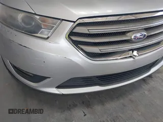 2014 Ford Taurus SEL z VIN 1FAHP2E82EG139690, wystawiony jako IAAI lot #42312483 z przebiegiem 170 029 mil mil oraz . Historia ofert i sprzedaży dostępna na DreamBid. Obrazek 6.