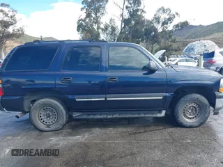 2005 Chevrolet Tahoe LT with VIN 1GNEC13T15R213638, listed as a IAAI auction lot 41787524 with 153,709 mi miles and . Bid and sale history available at DreamBid. Image 13.