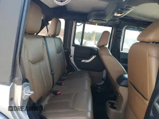 2014 Jeep Wrangler Unlimited Sahara with VIN 1C4HJWEG3EL130272, listed as a Copart auction lot 46860245 with 102,716 mi miles and Clean Title. Bid and sale history available at carsss.com. Image 10.