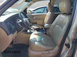 2005 Mazda Tribute i with VIN 4F2YZ92Z55KM53695, listed as a Copart auction lot 61494224 with 144,911 mi miles and Salvage Title. Bid and sale history available at carsss.com. Image 7.