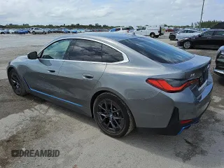 2024 BMW i4 eDrive40 z VIN WBY73AW0XRFS98892, wystawiony jako Copart lot #56057495 z przebiegiem 24 943 mil mil oraz Tytuł czysty. Historia ofert i sprzedaży dostępna na DreamBid. Obrazek 2.