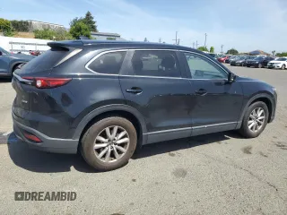 2017 Mazda CX-9 Sport z VIN JM3TCABY6H0131479, wystawiony jako Copart lot #57178805 z przebiegiem 98 698 mil mil oraz Szkoda całkowita • Salvage title. Historia ofert i sprzedaży dostępna na DreamBid. Obrazek 3.
