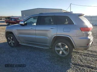 2014 Jeep Grand Cherokee Overland with VIN 1C4RJFCG0EC226397, listed as a Copart auction lot 80295784 with 131,921 mi miles and Salvage Title. Bid and sale history available at DreamBid. Image 2.