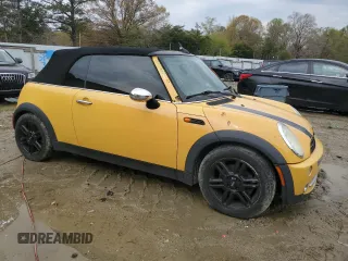 2007 MINI Convertible with VIN WMWRF33507TG17373, listed as a Copart auction lot 52818825 with 207,096 mi miles and Salvage Title. Bid and sale history available at DreamBid. Image 4.