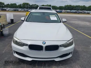 2013 BMW 3 Series 328i with VIN WBA3A5G51DNP26142, listed as a IAAI auction lot 41767977 with 129,440 mi miles. Bid and sale history available at carsss.com. Image 6.