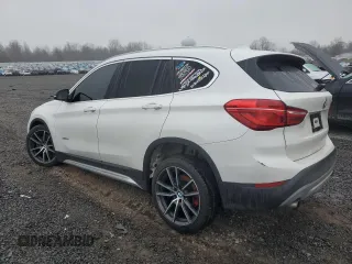 2016 BMW X1 xDrive28i with VIN WBXHT3C36GP881275, listed as a Copart auction lot 49181055 with 129,469 mi miles and Salvage Title. Bid and sale history available at carsss.com. Image 2.
