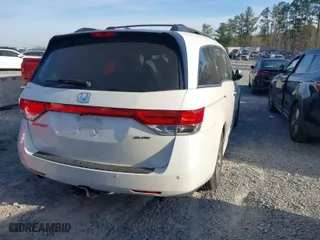 2016 Honda Odyssey Touring Elite with VIN 5FNRL5H98GB127394, listed as a IAAI auction lot 41828133 with 161,144 mi miles. Bid and sale history available at carsss.com. Image 4.