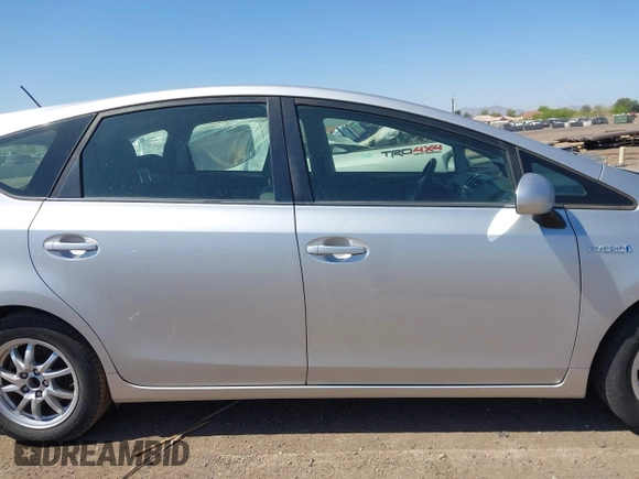 2014 Toyota Prius Two with VIN JTDZN3EU2EJ003764, listed as a IAAI auction lot 42018435 with 266,251 mi miles and . Bid and sale history available at DreamBid. Image 13.