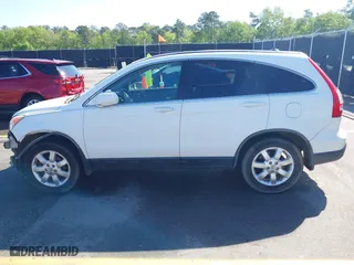 2009 Honda CR-V EX-L with VIN JHLRE48739C000915, listed as a IAAI auction lot 41976002 with 276,726 mi miles. Bid and sale history available at carsss.com. Image 15.