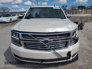 2015 Chevrolet Suburban LTZ with VIN 1GNSKKKC0FR130023, listed as a Copart auction lot 46630825 with 140,057 mi miles and Salvage Title. Bid and sale history available at carsss.com. Image 5.