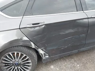 2020 Ford Fusion SE z VIN 3FA6P0HD5LR198744, wystawiony jako IAAI lot #42177820 z przebiegiem 97 520 mil mil oraz . Historia ofert i sprzedaży dostępna na DreamBid. Obrazek 6.