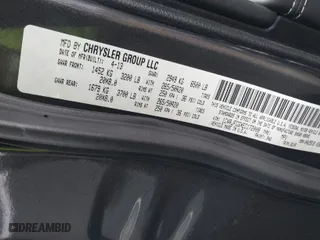 2014 Jeep Grand Cherokee Overland with VIN 1C4RJFCGXEC172008, listed as a IAAI auction lot 41719313 with 164,682 mi miles. Bid and sale history available at carsss.com. Image 9.
