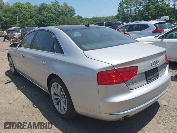 2011 Audi A8 with VIN WAURVAFD4BN019033, listed as a IAAI auction lot 42532173 with 97,486 mi miles and . Bid and sale history available at DreamBid. Image 3.