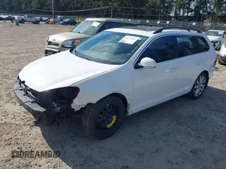 2012 Volkswagen Jetta SportWagen TDI with VIN 3VWPL7AJ8CM652661, listed as a IAAI auction lot 41670941 with 193,334 mi miles. Bid and sale history available at carsss.com. Image 2.